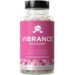 bottle of Eu Natural Vibrance Healthy Hair Vitamins