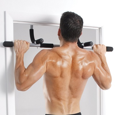 man exercising using iron gym equipment