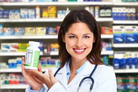 photo of woman holding bottle of supplement