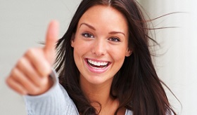 photo of woman thumbs up